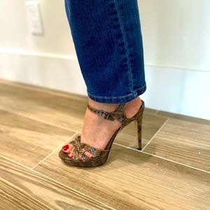 Vince Camuto Jessamae snakeskin platforms peep toe sandals.
